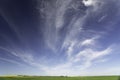 Canadian prairie landscape panoramic view under a deep blue dramatic sky in Rocky View County Alberta Canada