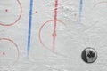 Canadian puck and a fragment of the hockey arena with markings