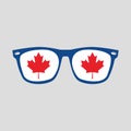 Canadian red maple leaf sign on blue frame sunglasses icon on gray