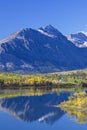 Canadian Rockies reflected in lake near Waterton National Park