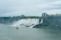 Canadian side of Niagara Falls in autumn. ship with tourists Royalty Free Stock Photo
