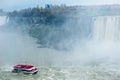 Canadian side of Niagara Falls in autumn. ship with tourists Royalty Free Stock Photo