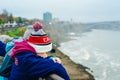 Canadian side of Niagara Falls in autumn. ship with tourists Royalty Free Stock Photo