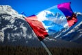 Canadien Flag overlayed on a mountain scene
