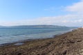 Sea calm skies and docks Royalty Free Stock Photo