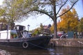 The canal in Amsterdam. Blue sky and boat. in the city. Free space for text.