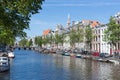 Canal in Amsterdam with historic mansions Royalty Free Stock Photo