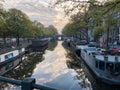 Canal in Amsterdam in the morning Royalty Free Stock Photo