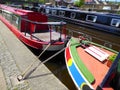 Narrowboats moored in a canal basin