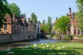 Canal and Beguinage in Bruges, Belgium Royalty Free Stock Photo