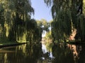 Canal with big trees around the old town of Sneek