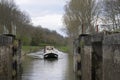 Canal boat approaching Ecluse 37 Moulin Brule, Les Rompees, Saint-Didier, Nievre, Burgundy