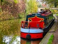 Canal boat moored next to a path in england Royalty Free Stock Photo