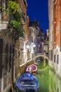 Canal with boats and old buildings at night. Venice Royalty Free Stock Photo