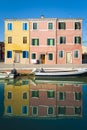 Canal, boats and reflections, Burano, Italy