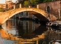 Canal and bridge reflection the water canal in Venice, Italy Royalty Free Stock Photo