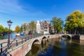 Canal and bridges traditional Dutch houses at Keizersgracht in Amsterdam, Netherlands