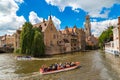 Canal in Bruges and Belfry tower