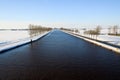 Canal in a cold white winter landscape Royalty Free Stock Photo