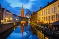 Canal Dijver and a Church of Our Lady in Bruges Royalty Free Stock Photo