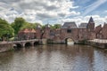 The canal Eem with in the background the medieval gate The Koppelpoort in the city of Amersfoort in The Netherlands Royalty Free Stock Photo