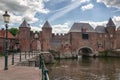 The canal Eem with in the background the medieval gate The Koppelpoort in the city of Amersfoort in The Netherlands Royalty Free Stock Photo