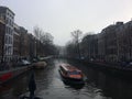 Canal Ferry Cruising Through Amsterdam Canal