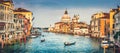 Canal Grande and Basilica di Santa Maria della Salute at sunset in Venice, Italy Royalty Free Stock Photo