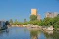 Canal in The Hague, with houseboats and apartment towers Royalty Free Stock Photo