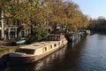 Canal with house boats in Amsterdam, Holland Royalty Free Stock Photo