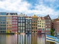 Canal houses on the Damrak in Amsterdam
