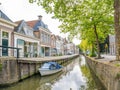 Canal and houses in old town of Bolsward, Friesland, Netherlands