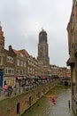 Canal in the inner city of Utrecht and dom tower