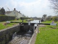 Canal lock gate and lock keepers cottage Royalty Free Stock Photo