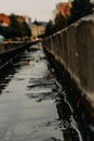 Canal in the middle of the city with water Royalty Free Stock Photo