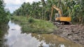 Canal Normalitation by Excavator Royalty Free Stock Photo