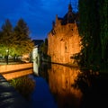 Canal and Old Houses at Night in Brugge Royalty Free Stock Photo