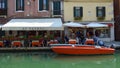 Canal Side Restaurants and Poer Boat Murano Venice