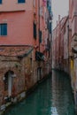 Canal streets with gondolas and boats in Venice, Italy