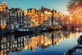 Canal at sunset. Amsterdam is the capital