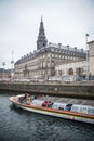 Canals in Copenhagen. Here passing the Christiansborg Castle. Denmark Royalty Free Stock Photo