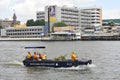 The Canal System Division Department of Drainage & Sewerage boat are collecting waste in the river