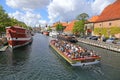 Canal tourboat on sightseeing trip on canal in Copenhagen, Denmark Royalty Free Stock Photo