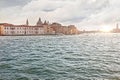 Canal in Venice with boats and old houses in the summer in sunny weather, Italy, Europe