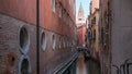 Canal in Venice timelapse. Channel, bridges, historical, old houses and boats. Venice, Italy