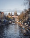 Canal view of Amsterdam, late afternoon in autumn, Netherlands Royalty Free Stock Photo