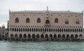 Canal-view of Ducal Palace in Venice with gondolas