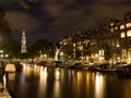 Canal With Westerkerk In Amsterdam At Night