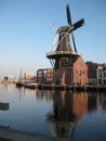 A canal and windmill view in Haarlem