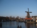 A canal and windmill view in Haarlem